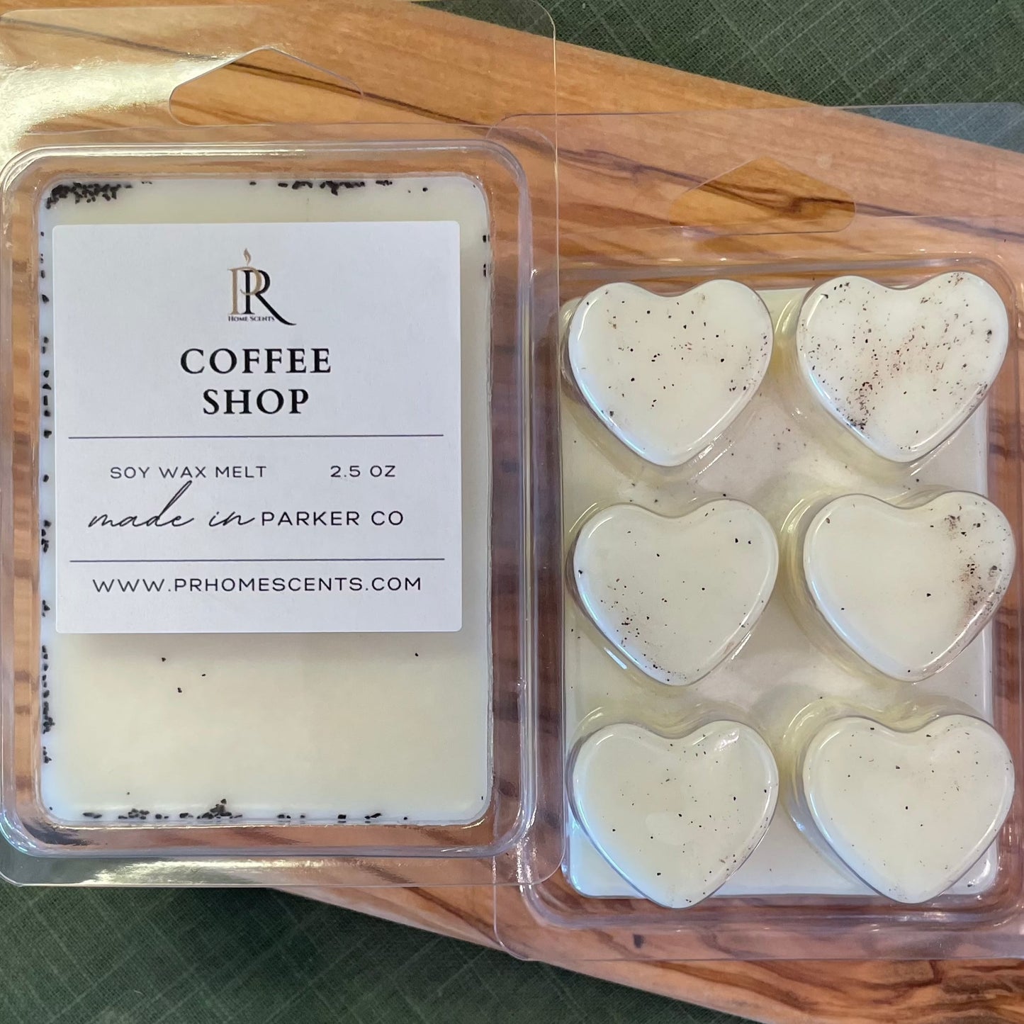 Close-up of heart-shaped soy wax melts, generously sprinkled with coffee grounds. Infused with the rich blend of freshly brewed coffee, vanilla, cream, and sugar. Experience a cozy coffee haven at home with these aromatic delights. #CoffeeShopMelts #SoyWaxAromas #starbucks