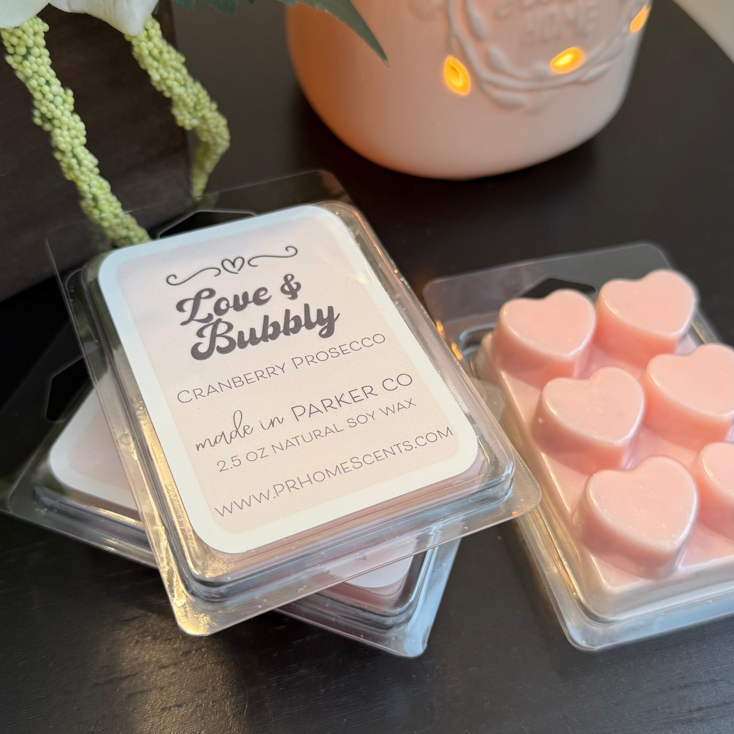 Love & Bubbly soy wax candle melts in heart-shaped containers with sparkling cranberry prosecco scent. 6 melts per package. Long-lasting fragrance.