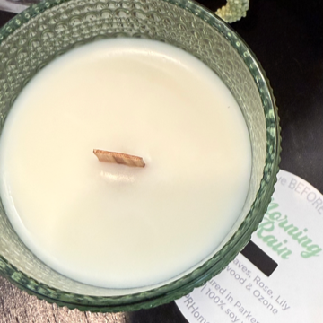 Morning Rain soy candle with green leaves, rose, lily, sandalwood, and ozone. Crackling wood wick, 40-50 hours burn time, phthalate-free.